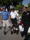 Dr Dan with our officer on skates, HEY I hope he got his five year shirt