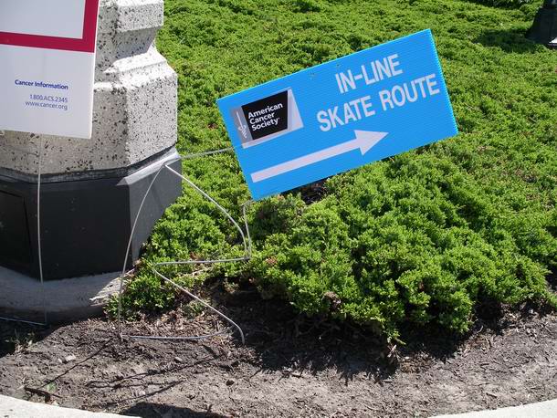 These new signs turned out to be a real work of art. Notice what we had to do with the metal stands to get them in the ground.