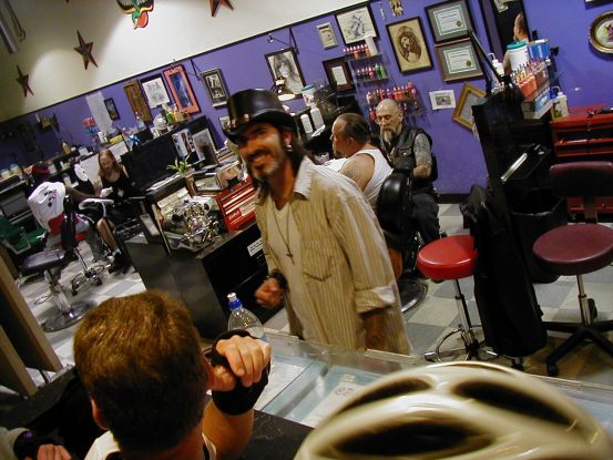 Getting the lowdown from the man in the hat.