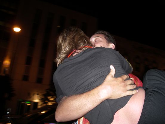 They embrace, ...