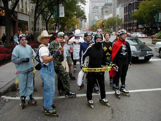 Skaters taking to Michigan Ave. Yep, there's a cowboy in every crowd.