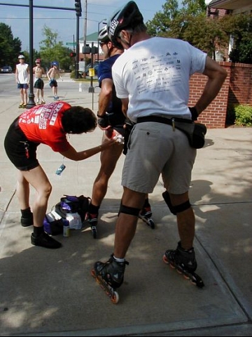 Road rash knows no limits. Here an unlucky soul gets a leg up on the main event.